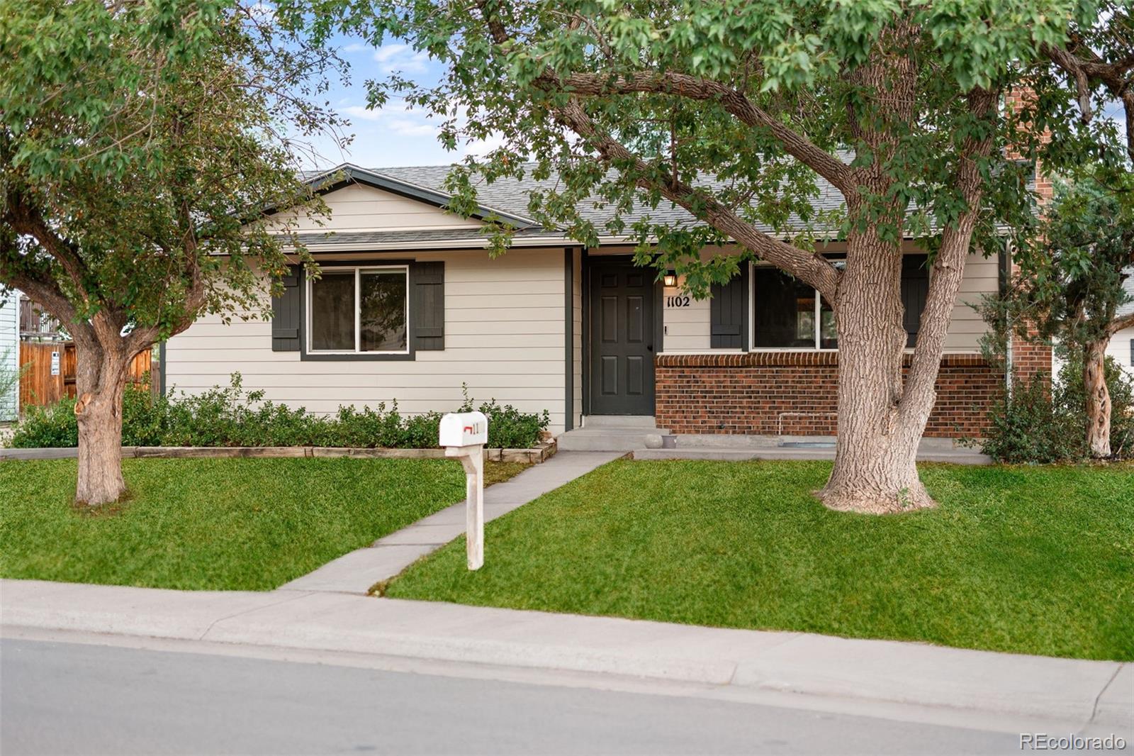  Aurora Home | MLS #: 69431871102  Nucla Street, Aurora Beds: 4 Baths: 3 Price: $465,000