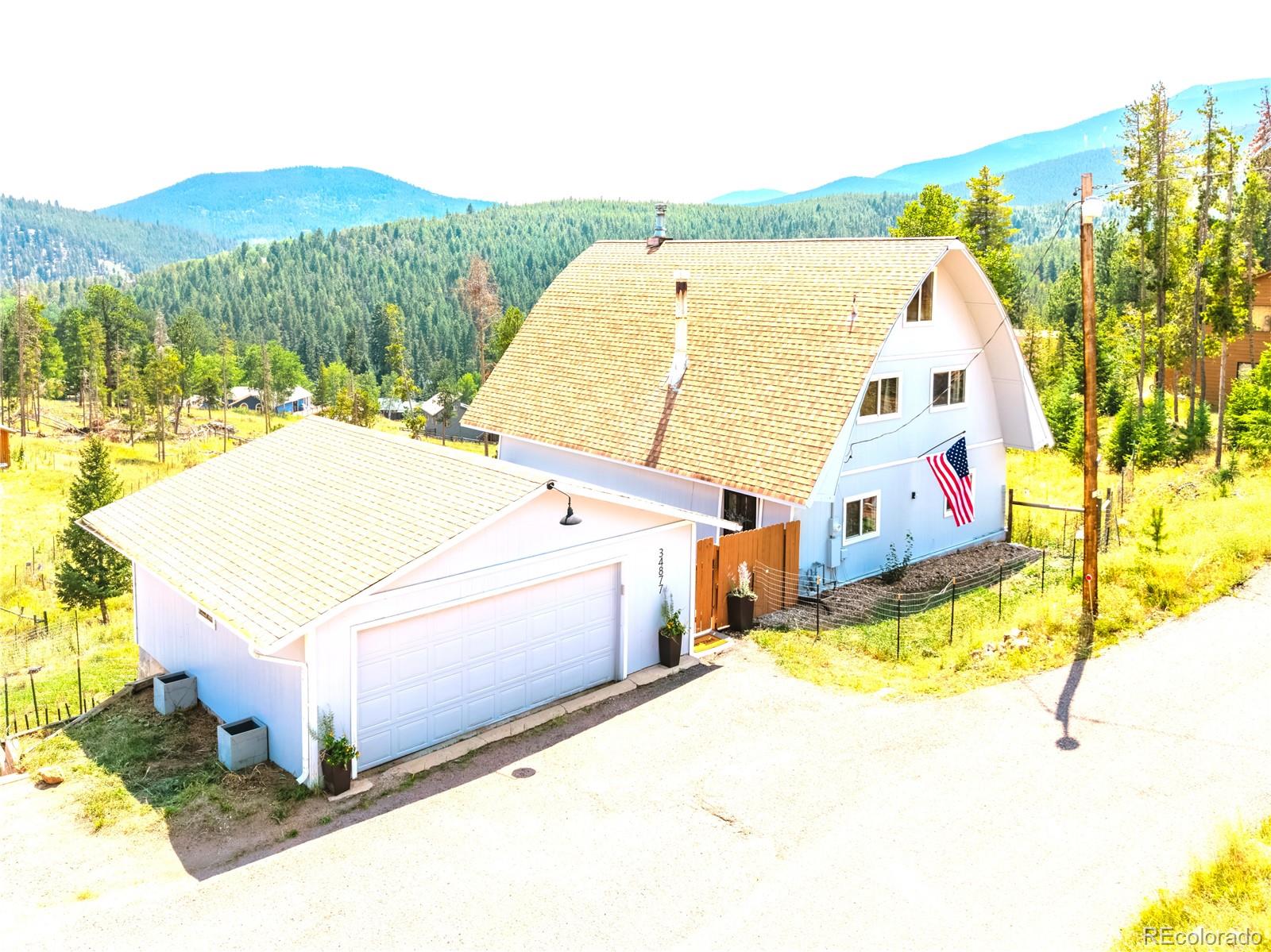 Brook Forest Evergreen Home | MLS #: 729551034877  Forest Estates Road, Evergreen Beds: 5 Baths: 3 Price: $725,000