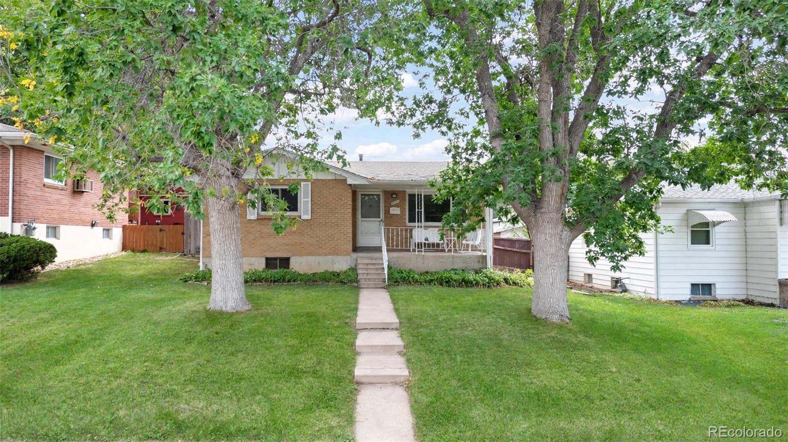  Englewood Home | MLS #: 16208384464 S Galapago Street, Englewood Beds: 4 Baths: 2 Price: $479,000