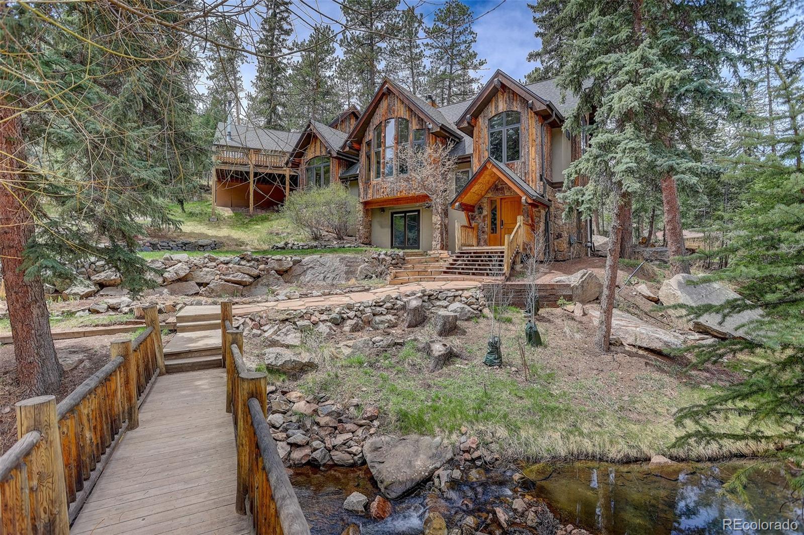  Evergreen Home | MLS #: 407303224844 N Turkey Creek Road, Evergreen Beds: 4 Baths: 3 Price: $1,029,000