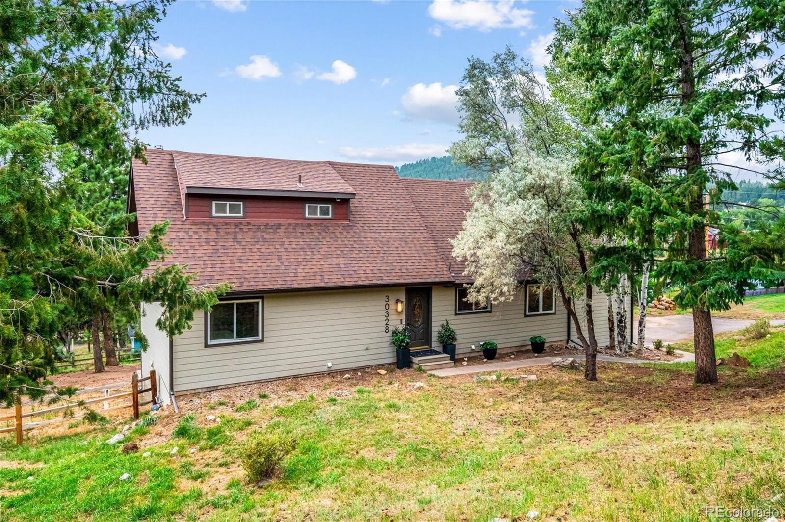  Evergreen Home | MLS #: 775912330328  Appaloosa Drive, Evergreen Beds: 4 Baths: 4 Price: $860,000