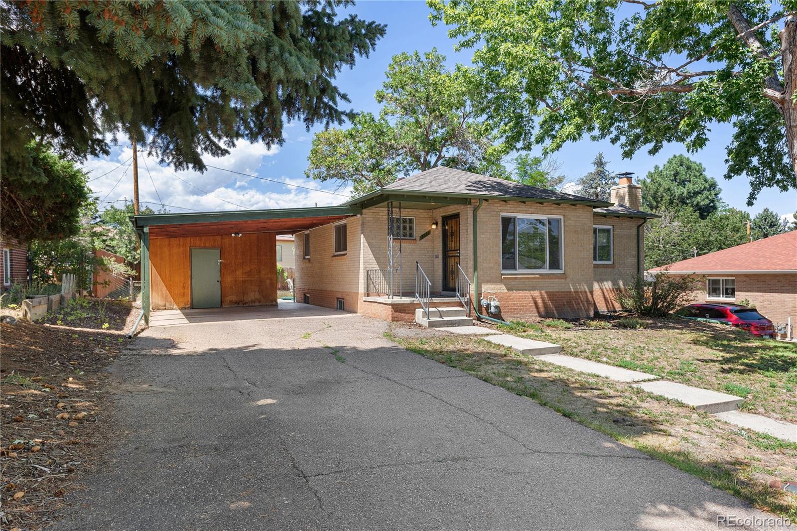 Harvey Park Denver Home | MLS #: 30839962331 S Wolff Street, Denver Beds: 3 Baths: 2 Price: $575,000