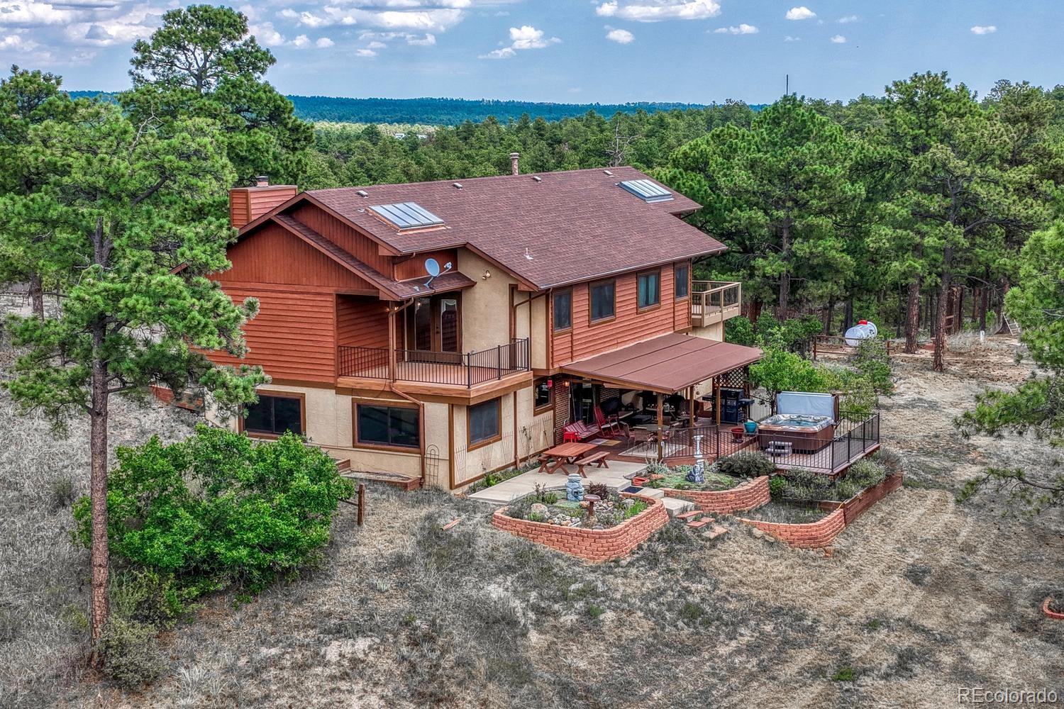 Unknown Colorado Springs Home | MLS #: 33675446435  Burgess Road, Colorado Springs Beds: 4 Baths: 3 Price: $955,000