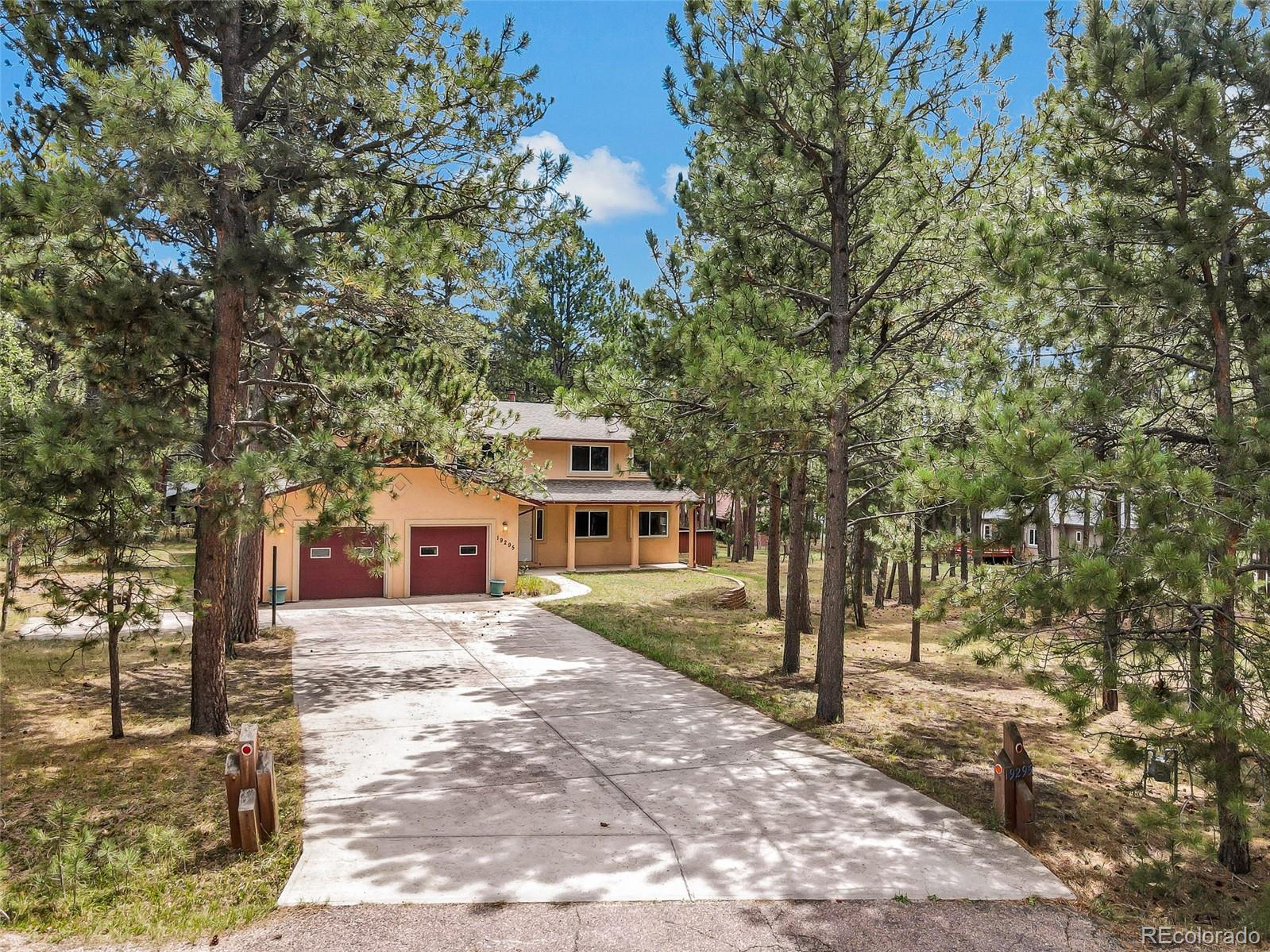Woodmoor Monument Home | MLS #: 503718819295  Rim of World Drive, Monument Beds: 4 Baths: 5 Price: $674,500