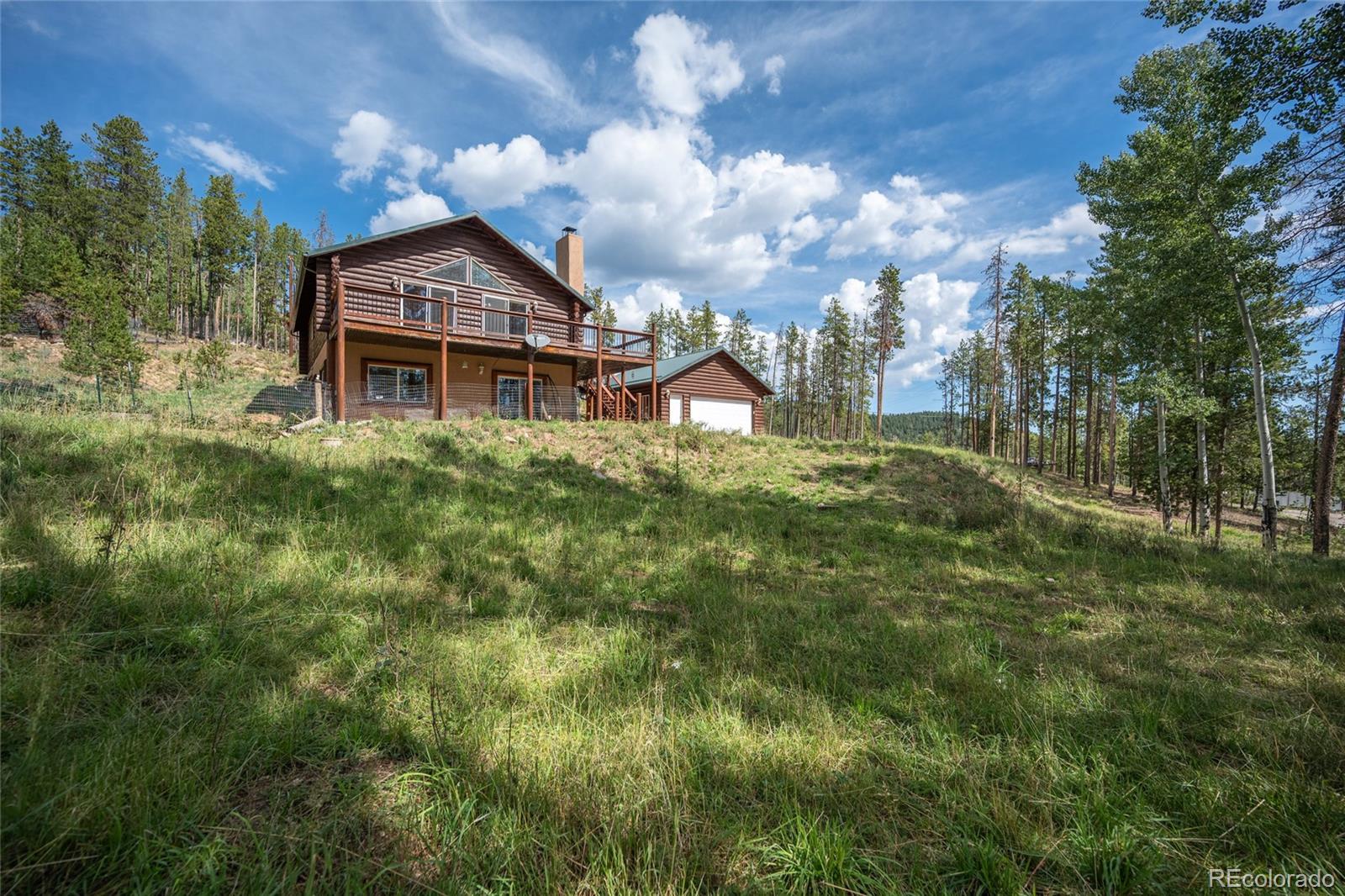 Brook Forest Evergreen Home | MLS #: 5799327721  Aspen Way, Evergreen Beds: 3 Baths: 3 Price: $710,000