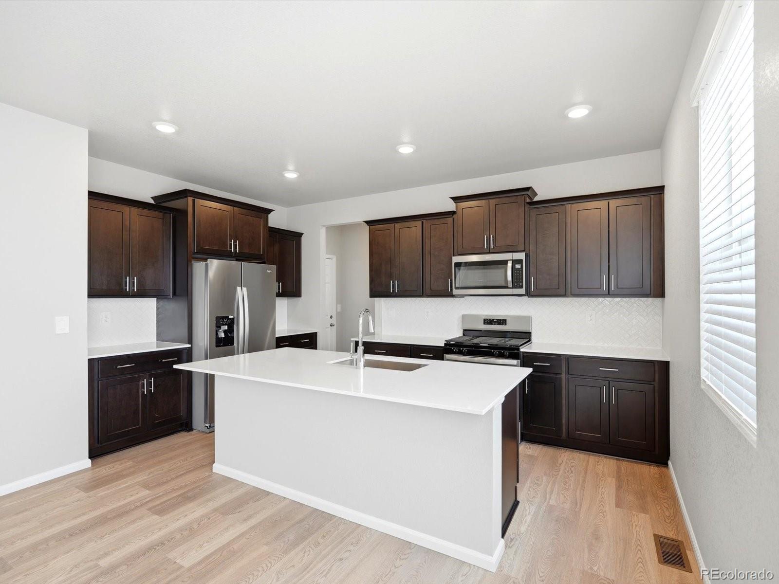  Firestone Home | MLS #: 50596586852  Quail Avenue, Firestone Beds: 4 Baths: 3 Price: $642,730