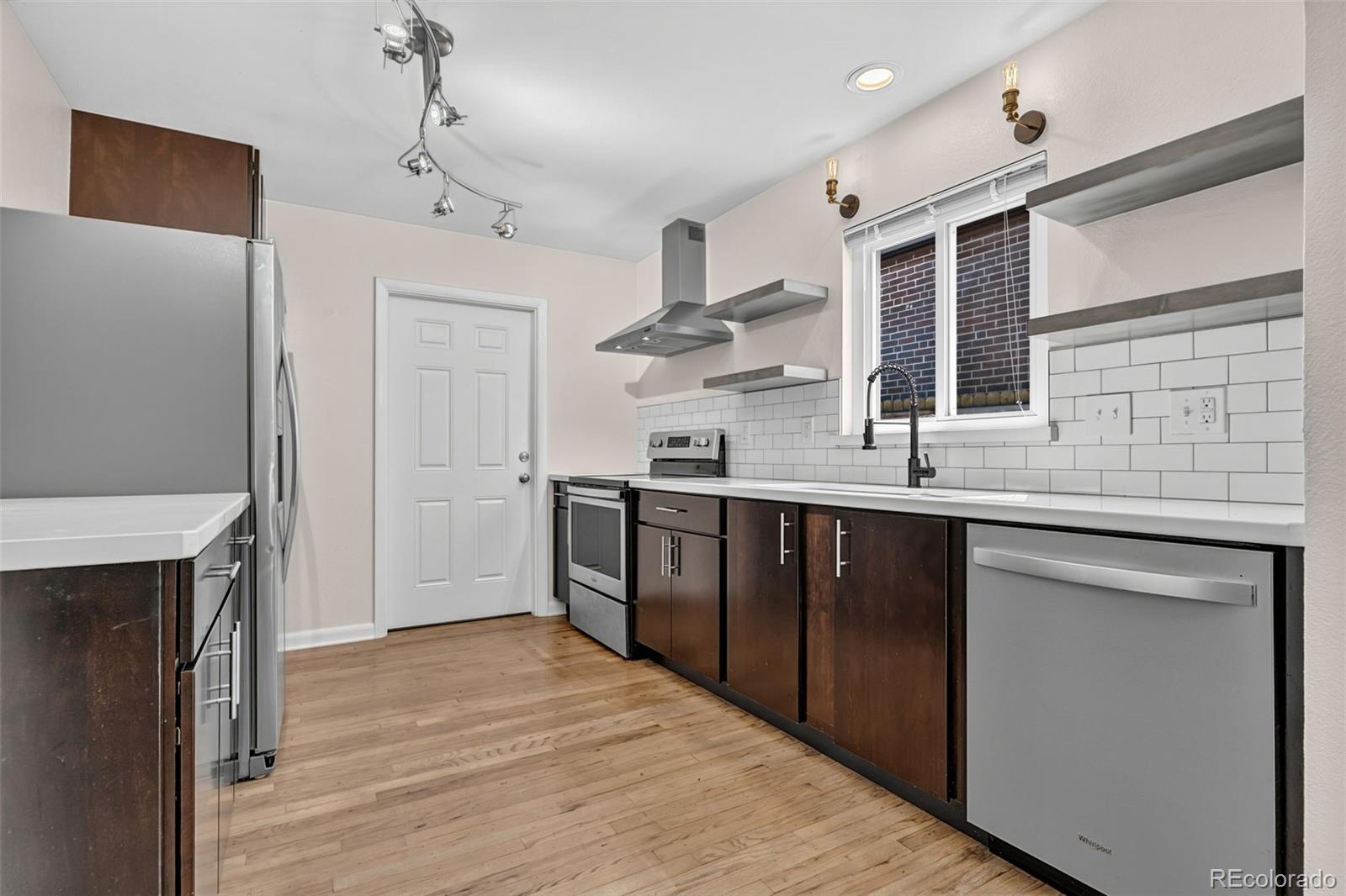 Du Denver Home | MLS #: 98218722544  Lamar Street, Denver Beds: 4 Baths: 3 Price: $775,000