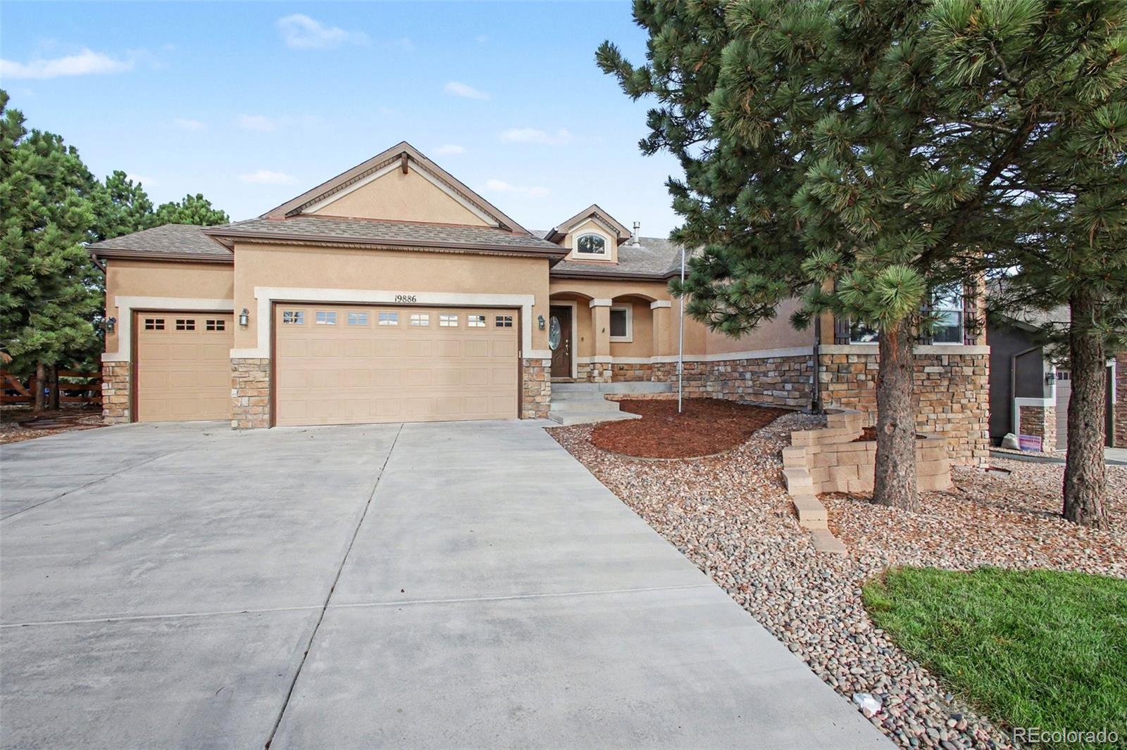  Monument Home | MLS #: 266015819886  Talking Rock Heights, Monument Beds: 5 Baths: 4 Price: $774,500