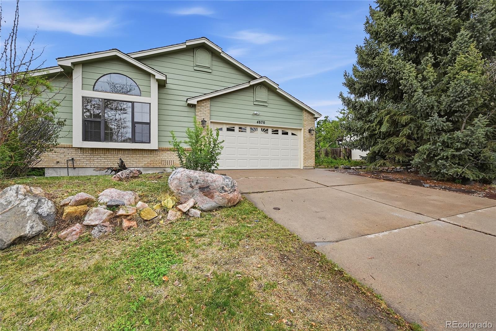 Stetson Hills Colorado Springs Home | MLS #: 44415294870  Purcell Drive, Colorado Springs Beds: 4 Baths: 3 Price: $499,900