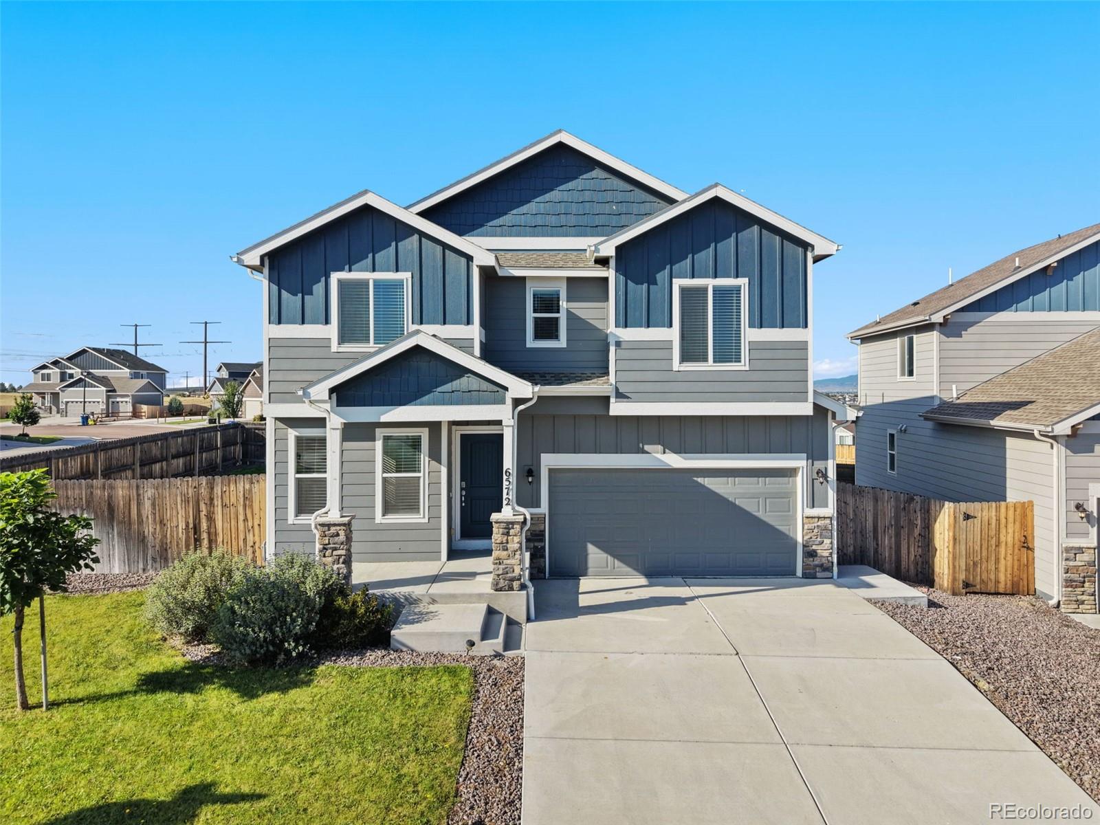  Colorado Springs Home | MLS #: 93836146572  Vedder Drive, Colorado Springs Beds: 5 Baths: 4 Price: $425,000