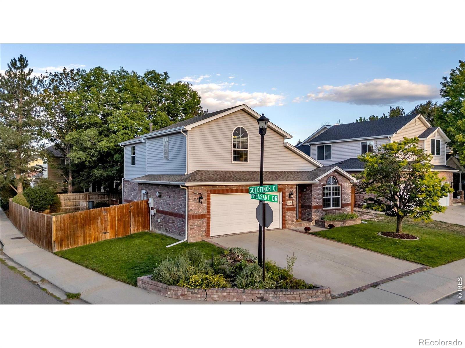  Longmont Home | MLS #: 45678910683852082  Gold Finch Court, Longmont Beds: 5 Baths: 4 Price: $699,000