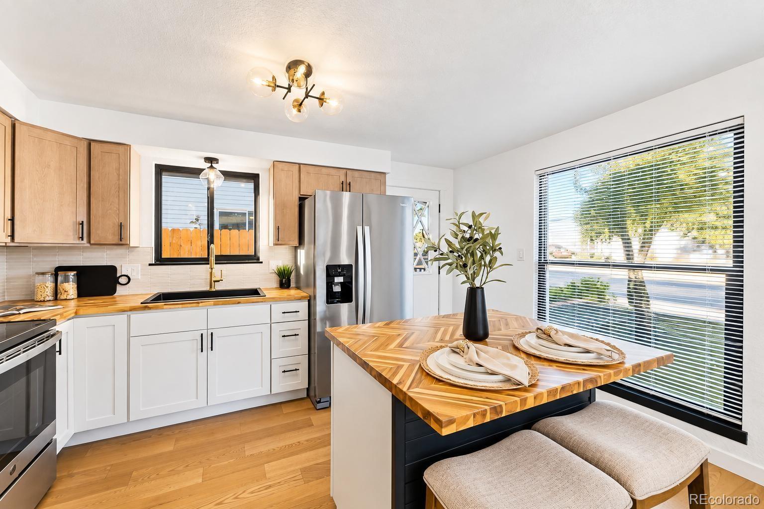 Lancaster Fort Lupton Home | MLS #: 63353151021  Pacific Court, Fort Lupton Beds: 4 Baths: 2 Price: $415,000
