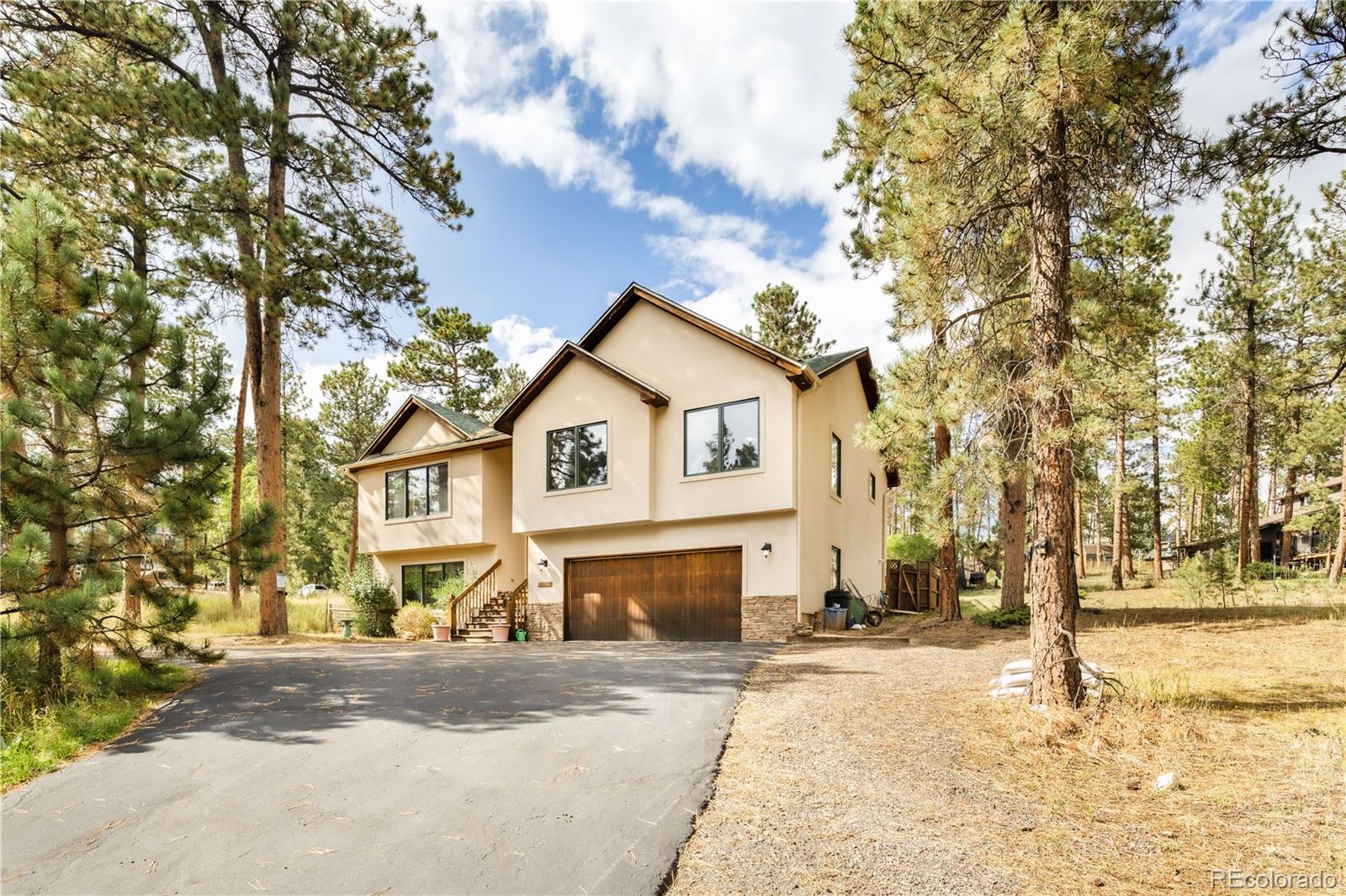  Conifer Home | MLS #: 347421228119  Tall Pines Lane, Conifer Beds: 4 Baths: 3 Price: $750,000