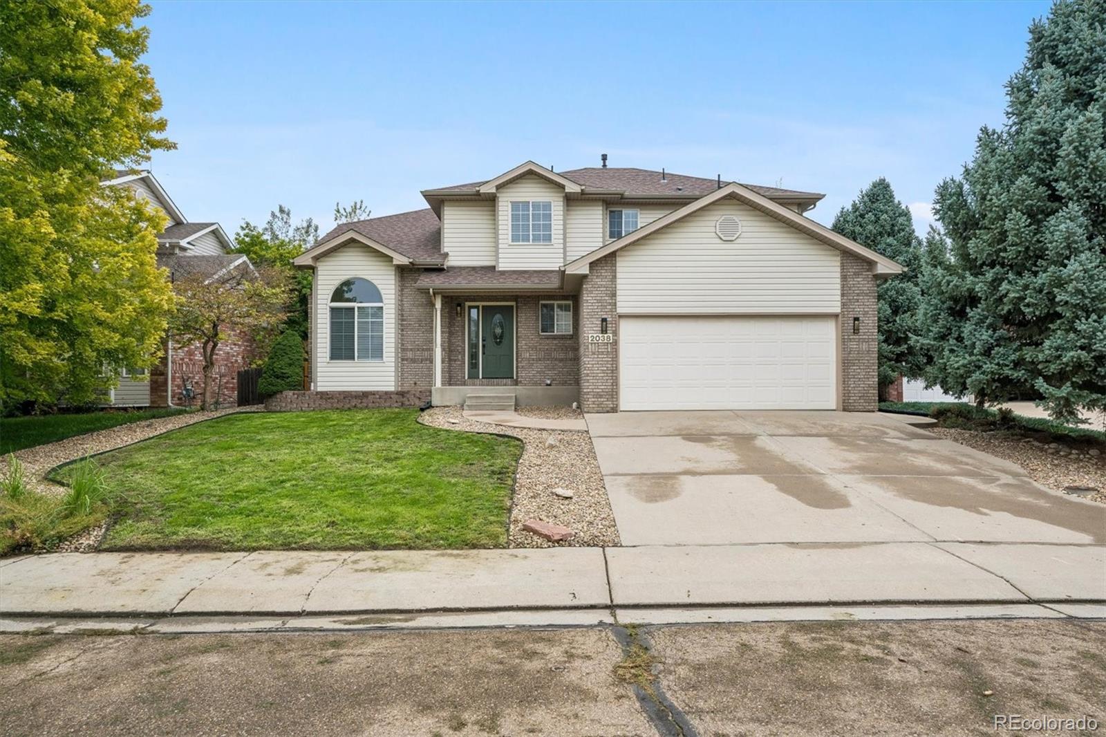  Longmont Home | MLS #: 50789302038  Falcon Drive, Longmont Beds: 5 Baths: 4 Price: $699,900