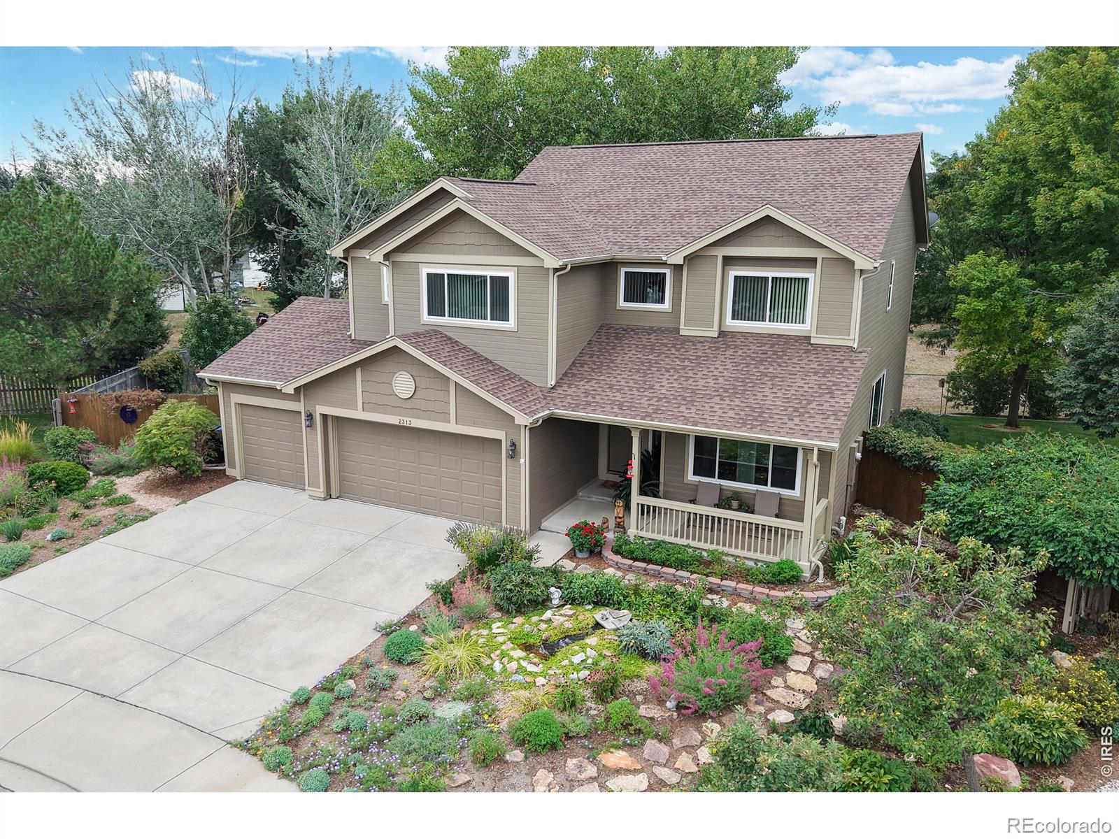  Longmont Home | MLS #: 45678910690872313  Village Lane, Longmont Beds: 5 Baths: 4 Price: $920,000