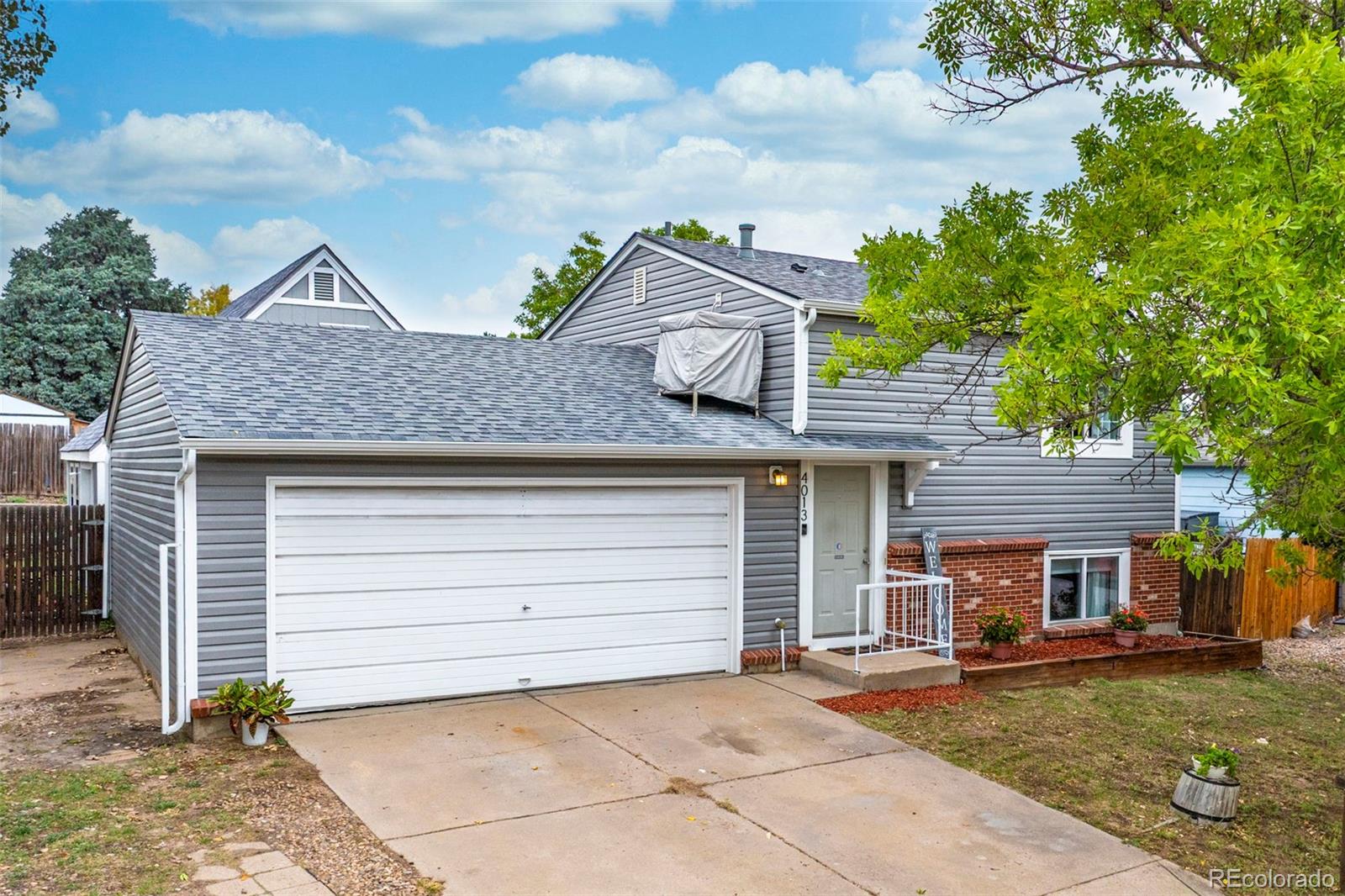  Aurora Home | MLS #: 24529754013 S Quintero Way, Aurora Beds: 3 Baths: 2 Price: $400,000