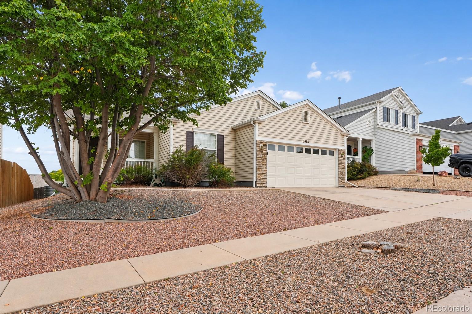  Colorado Springs Home | MLS #: 32554366585  Sonny Blue Drive, Colorado Springs Beds: 4 Baths: 3 Price: $350,000
