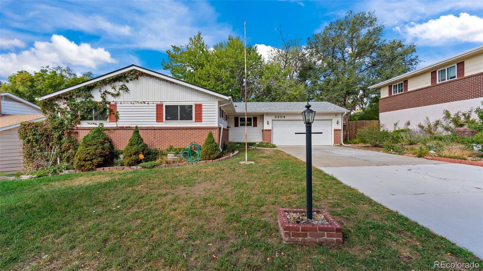  Colorado Springs Home | MLS #: 96681042204  Warwick Lane, Colorado Springs Beds: 5 Baths: 3 Price: $359,900