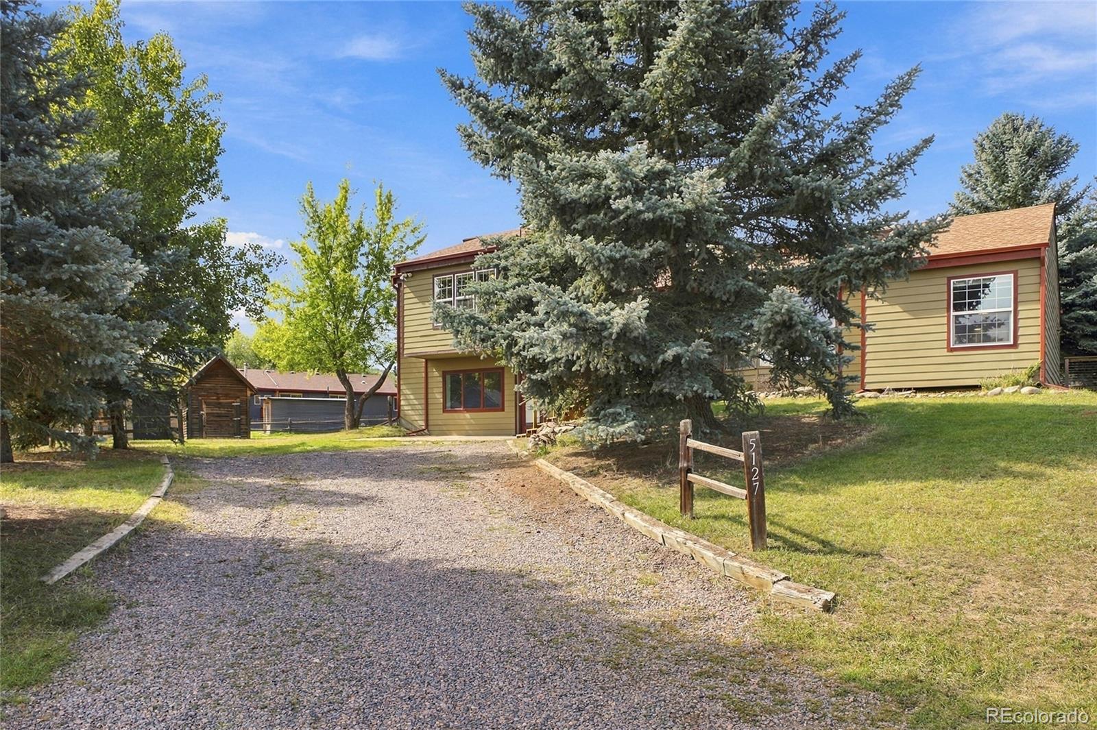  Evergreen Home | MLS #: 54349215127 S Greenwood Court, Evergreen Beds: 4 Baths: 3 Price: $800,000