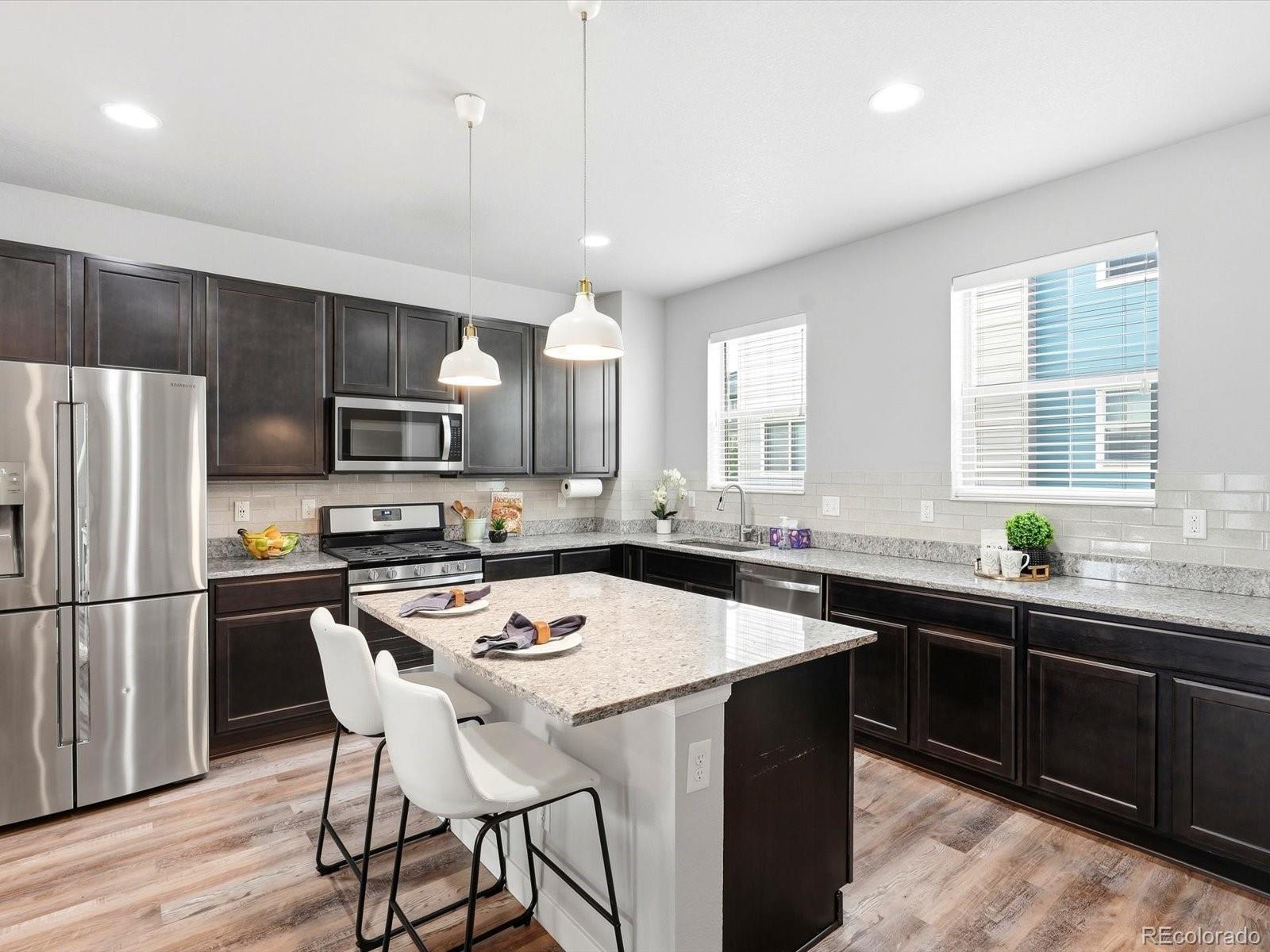  Denver Home | MLS #: 21572824220 E Warren Avenue, Denver Beds: 2 Baths: 3 Price: $495,000