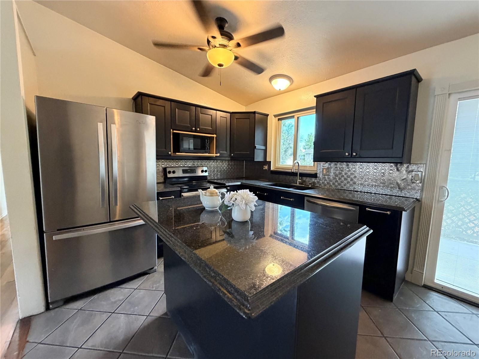 Aurora Home | MLS #: 50404543815 S Pitkin Circle, Aurora Beds: 5 Baths: 3 Price: $455,000