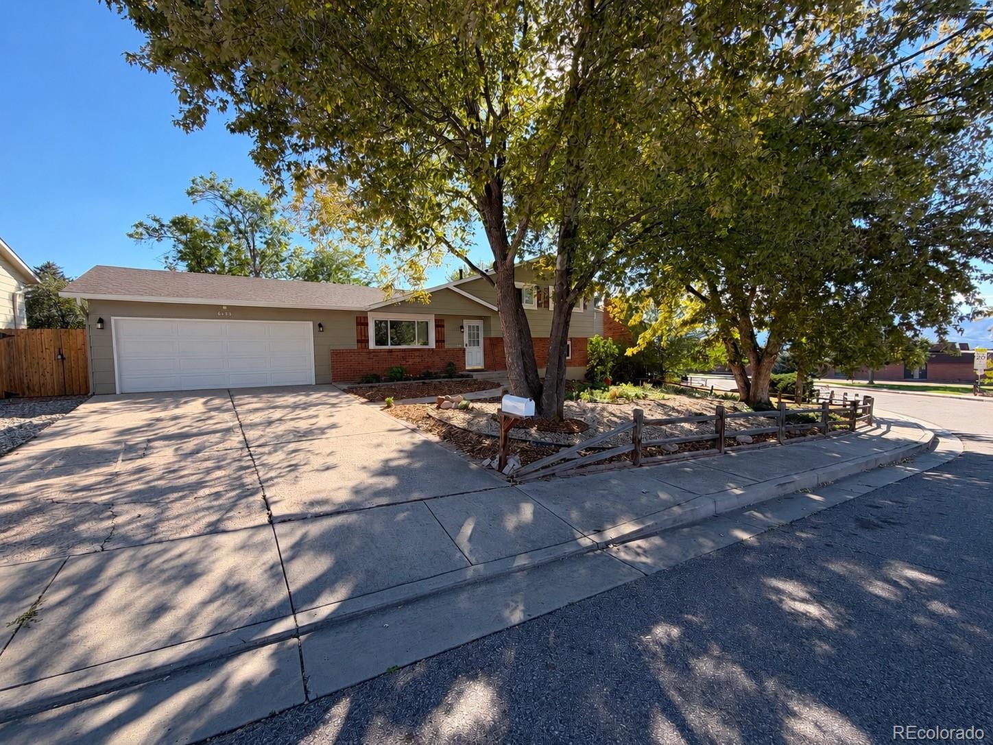  Colorado Springs Home | MLS #: 56238066135  Sapporo Drive, Colorado Springs Beds: 4 Baths: 3 Price: $425,000
