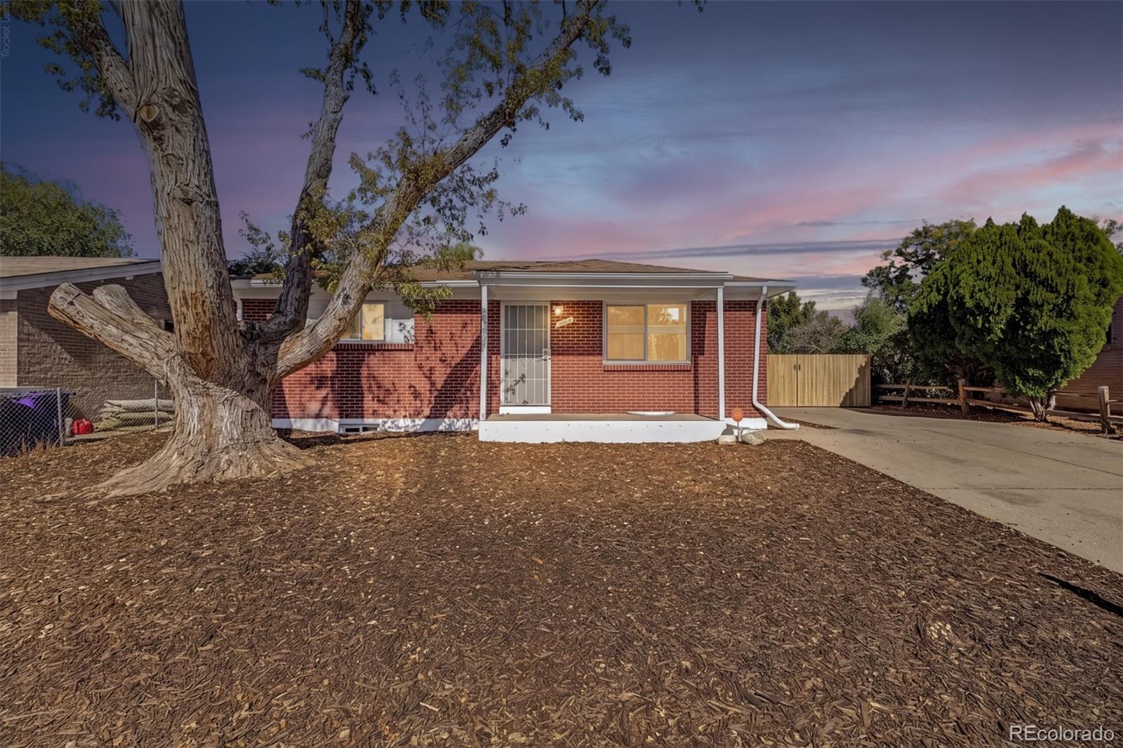 Montbello Denver Home | MLS #: 671676712265 E 55th Avenue, Denver Beds: 4 Baths: 2 Price: $409,900