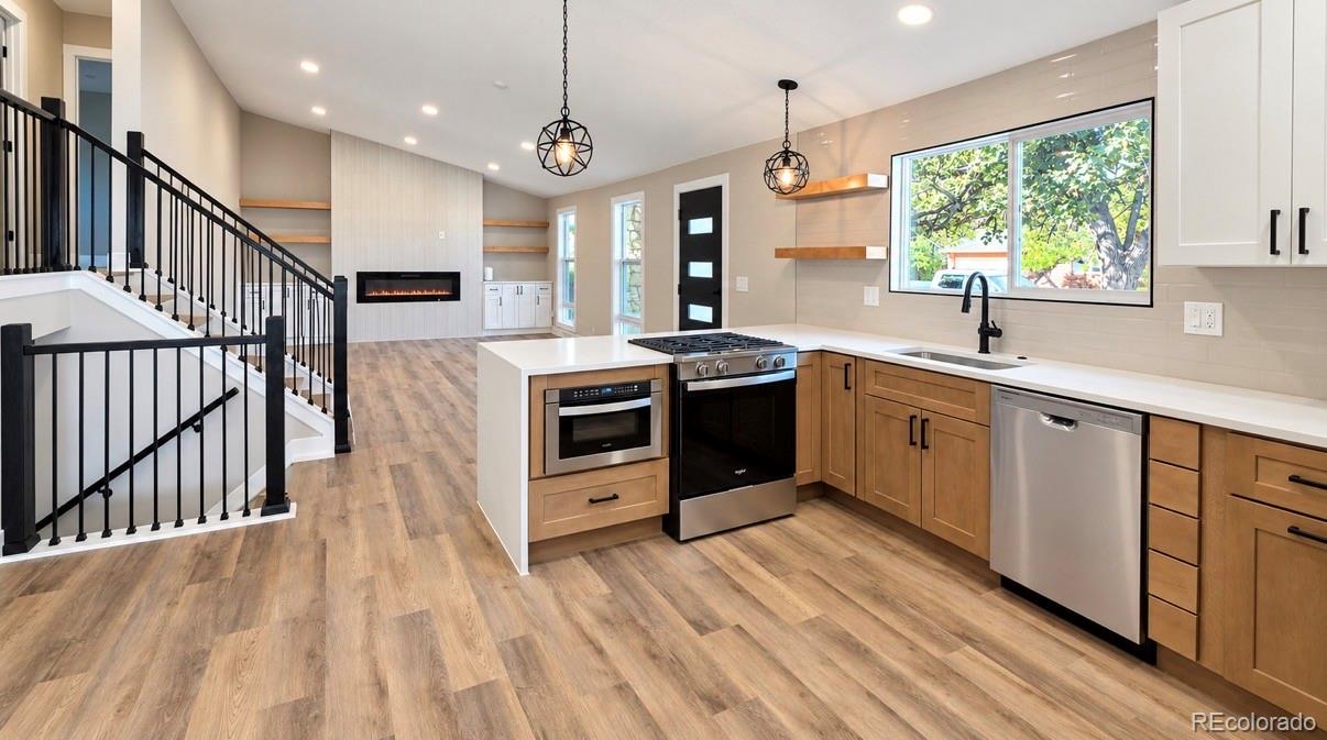 Club Crest Arvada Home | MLS #: 91517437550  Johnson Street, Arvada Beds: 5 Baths: 4 Price: $700,000