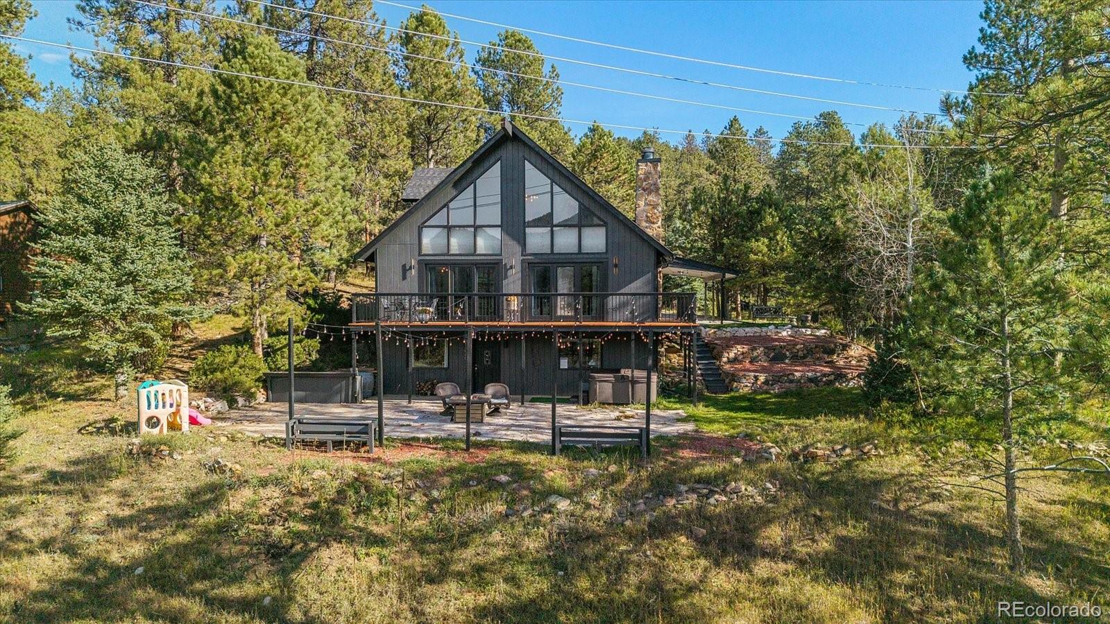 Upper Bear Creek Evergreen Home | MLS #: 39450664070 S Skyline Drive, Evergreen Beds: 4 Baths: 3 Price: $1,295,000