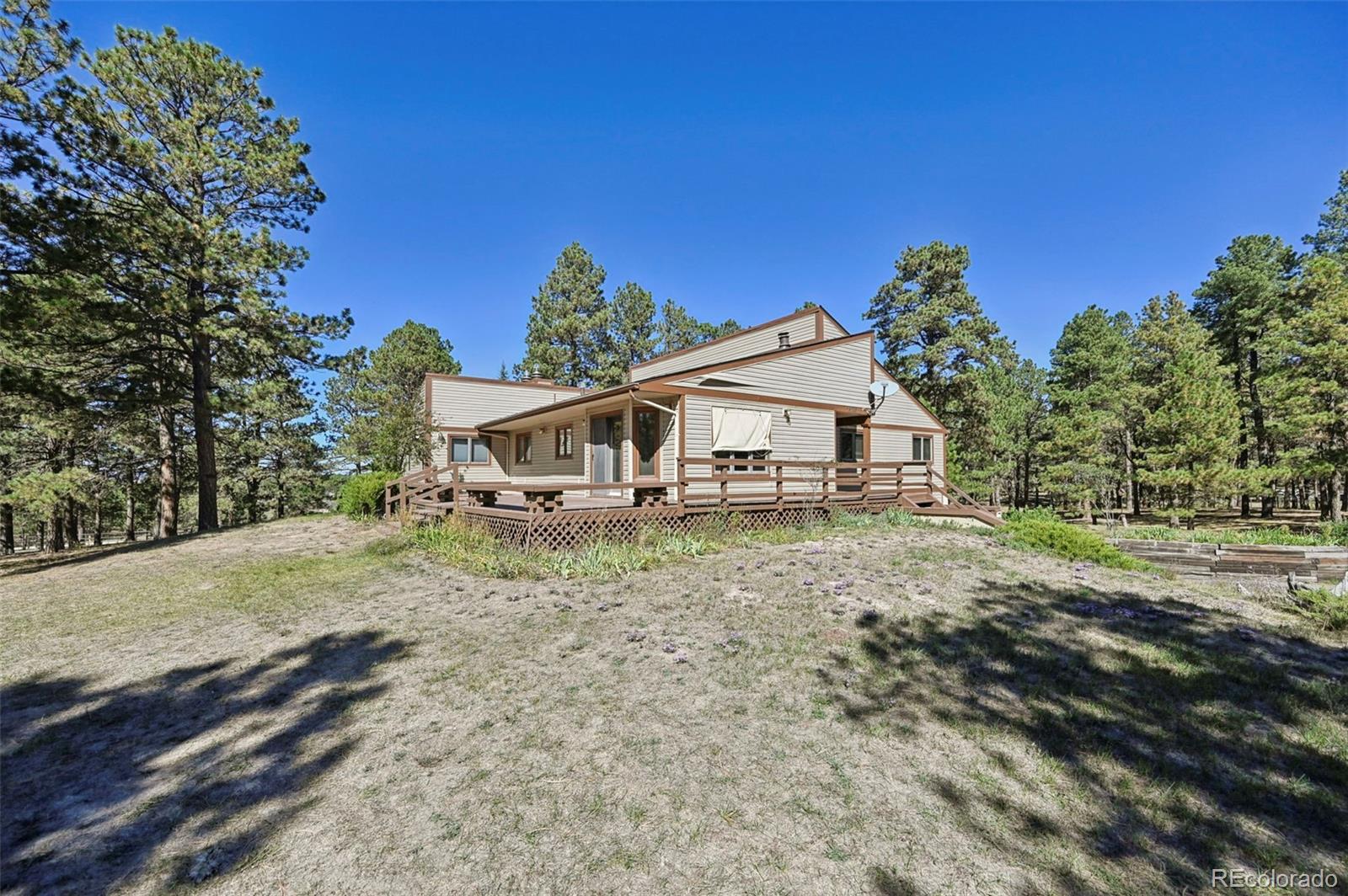 Wildwood Colorado Springs Home | MLS #: 64961088220  Bar X Terrace, Colorado Springs Beds: 4 Baths: 3 Price: $589,900