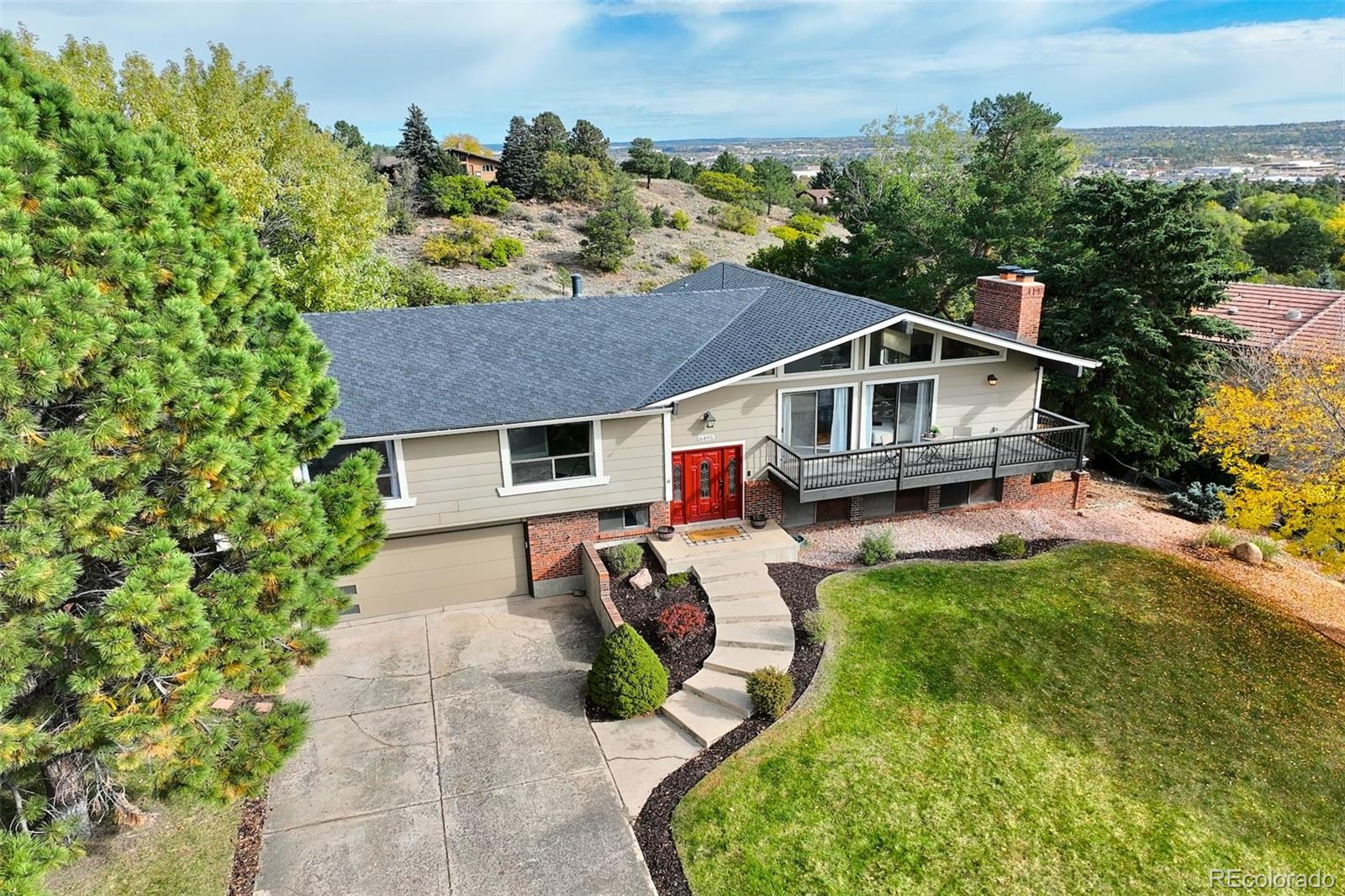  Colorado Springs Home | MLS #: 29753606495  Mesedge Drive, Colorado Springs Beds: 4 Baths: 3 Price: $630,000