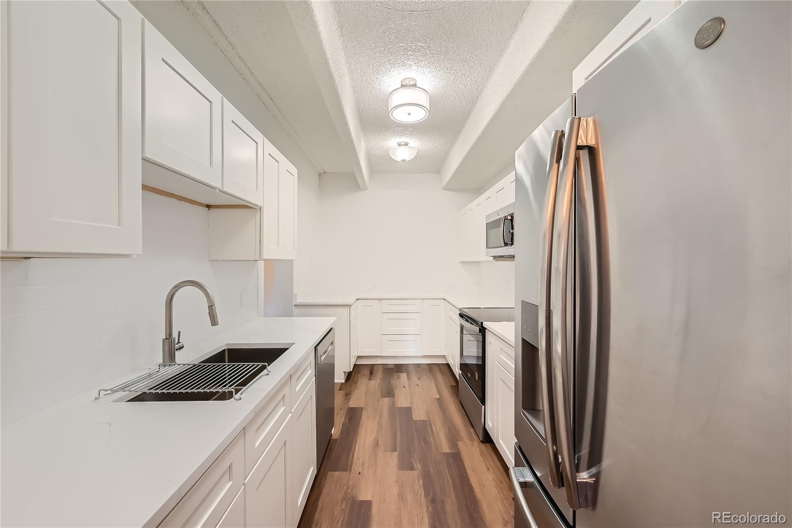 MLS Image #1 for 7865 e mississippi avenue,denver, Colorado