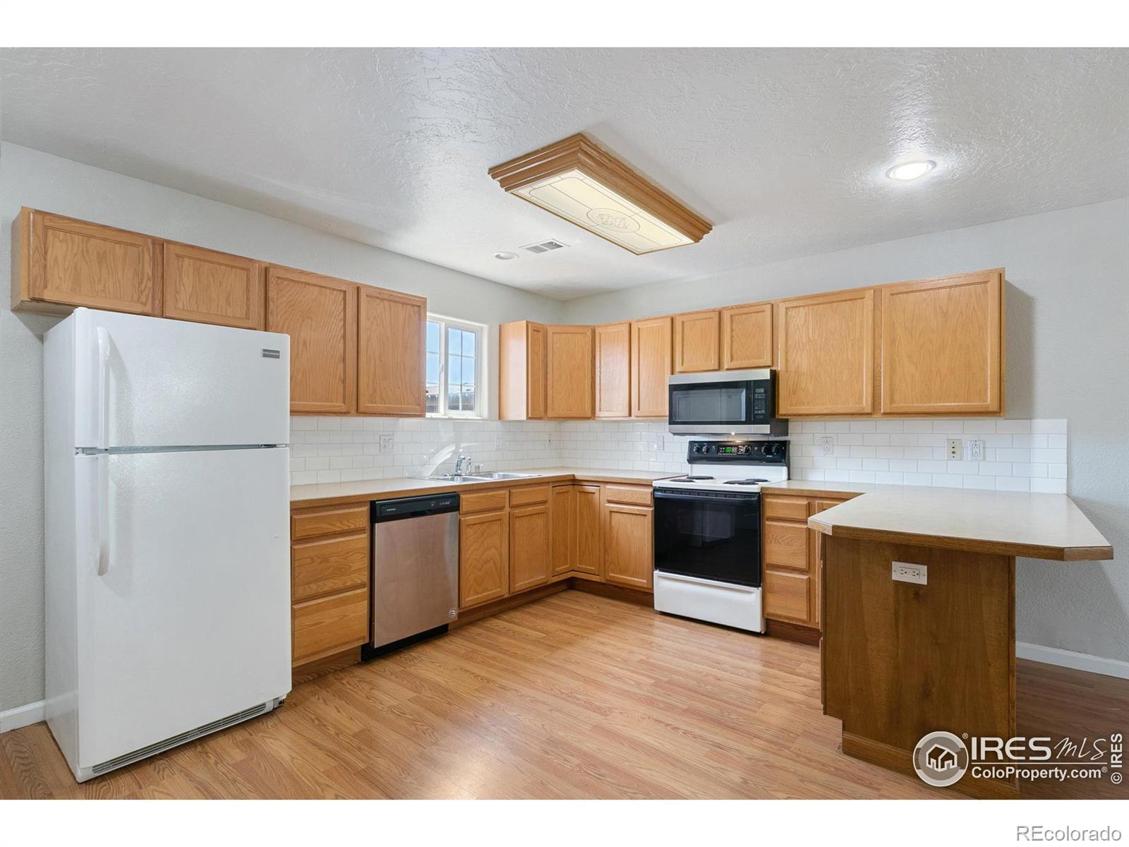 MLS Image #3 for 310  ash court,evans, Colorado