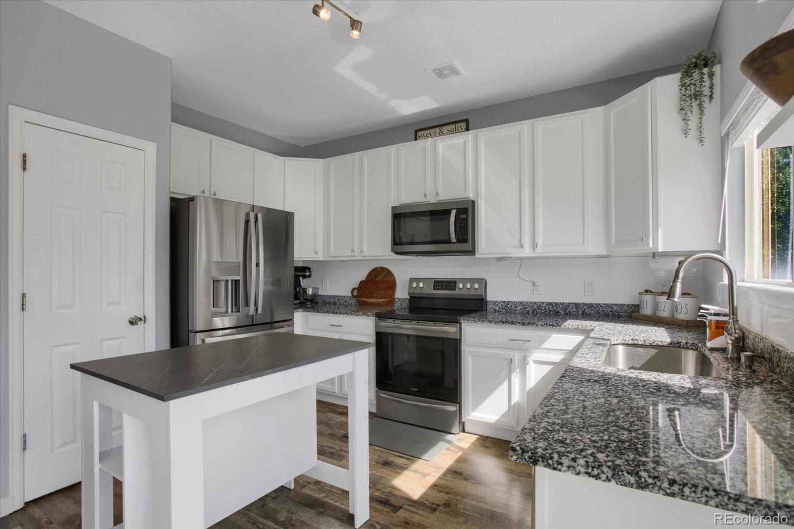 MLS Image #3 for 2432 s genoa way,aurora, Colorado