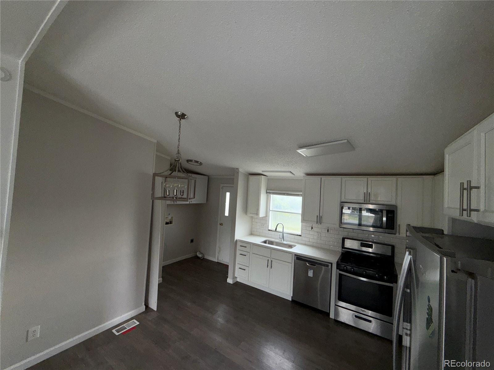 MLS Image #5 for 201  valdai street,brighton, Colorado