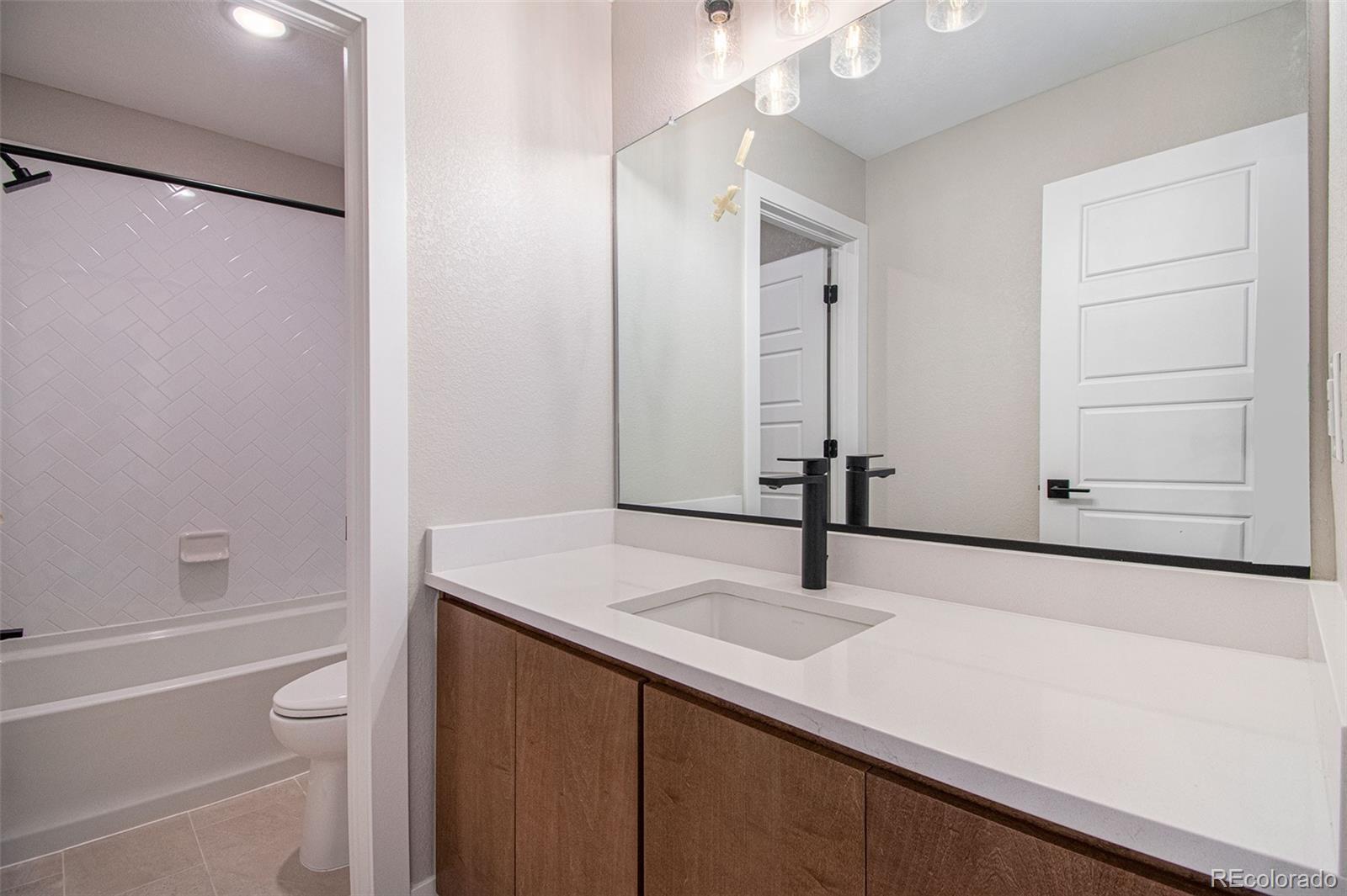 MLS Image #11 for 2076 s holly street,denver, Colorado