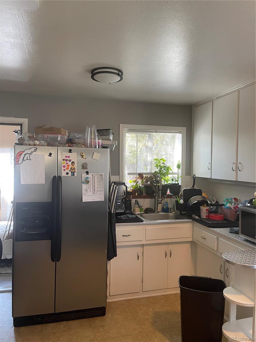 MLS Image #2 for 11502 e 7th avenue,aurora, Colorado