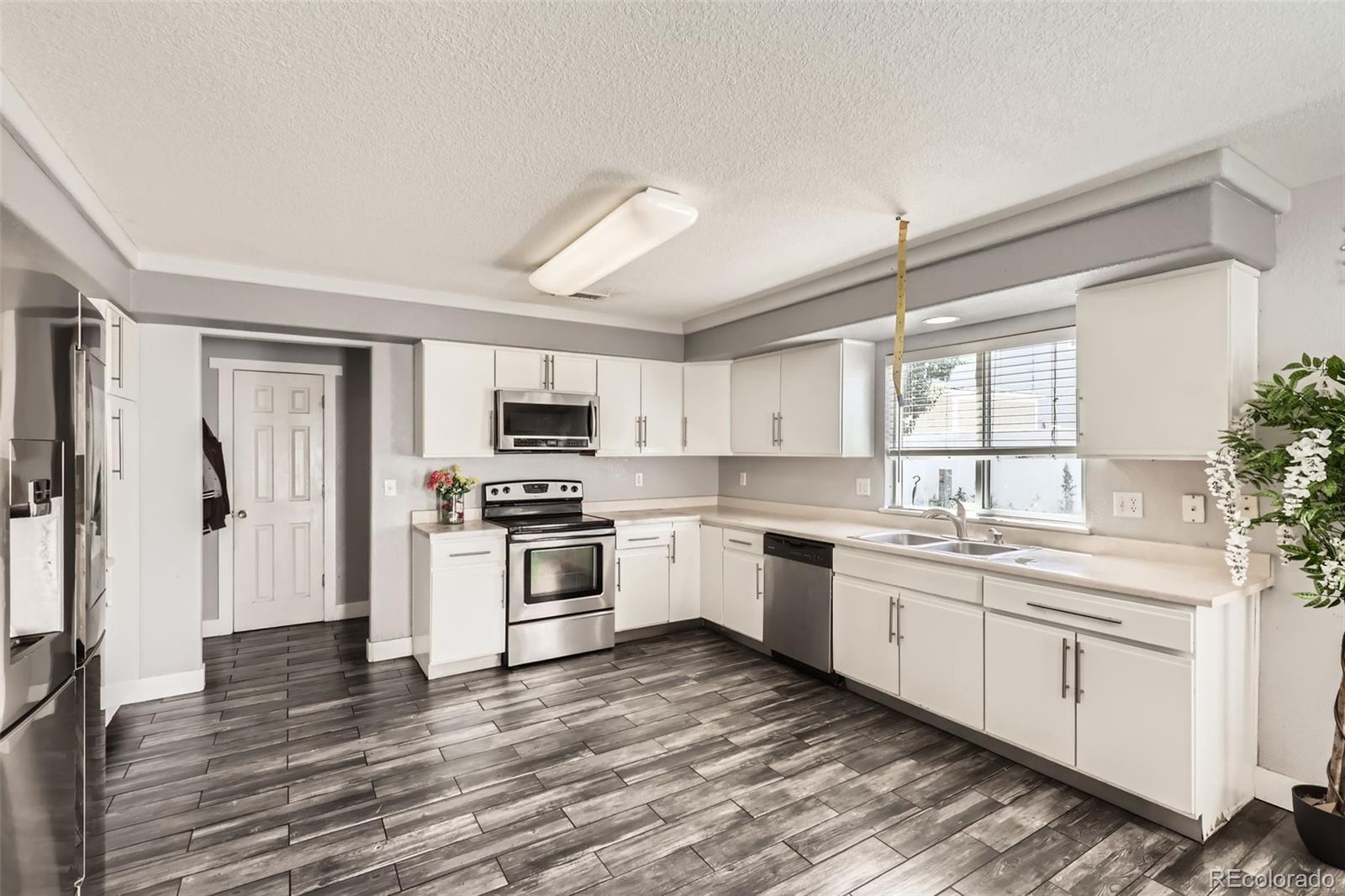 MLS Image #11 for 4955  genoa street,denver, Colorado