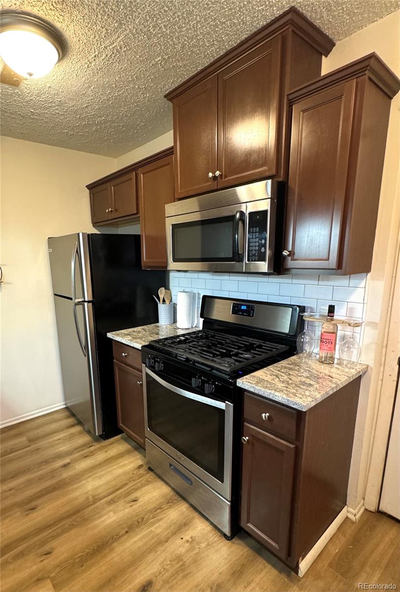 MLS Image #1 for 10702 e exposition avenue,aurora, Colorado