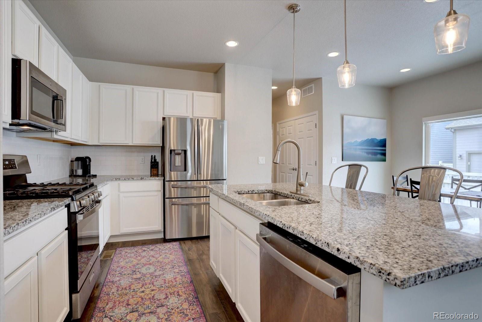 MLS Image #5 for 6612 n ceylon street,denver, Colorado