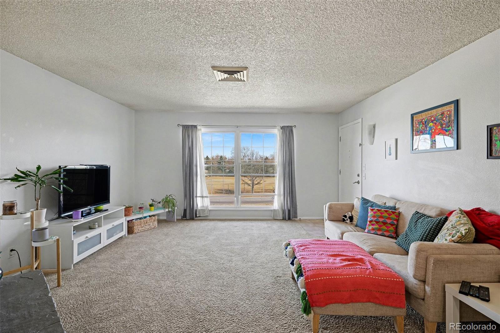 MLS Image #5 for 3825 s monaco parkway 212,denver, Colorado