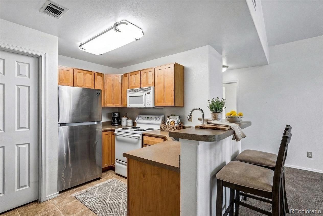 MLS Image #5 for 8691 e dry creek road,englewood, Colorado
