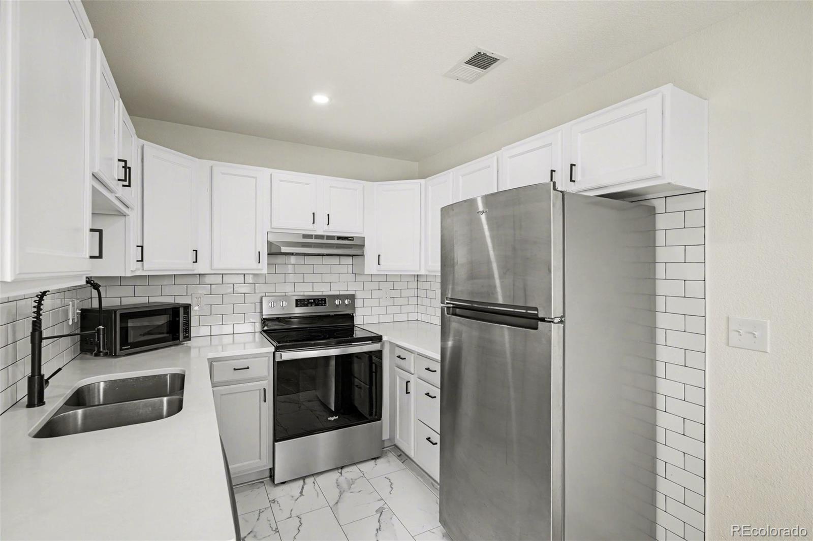 MLS Image #0 for 3200 s federal boulevard,denver, Colorado