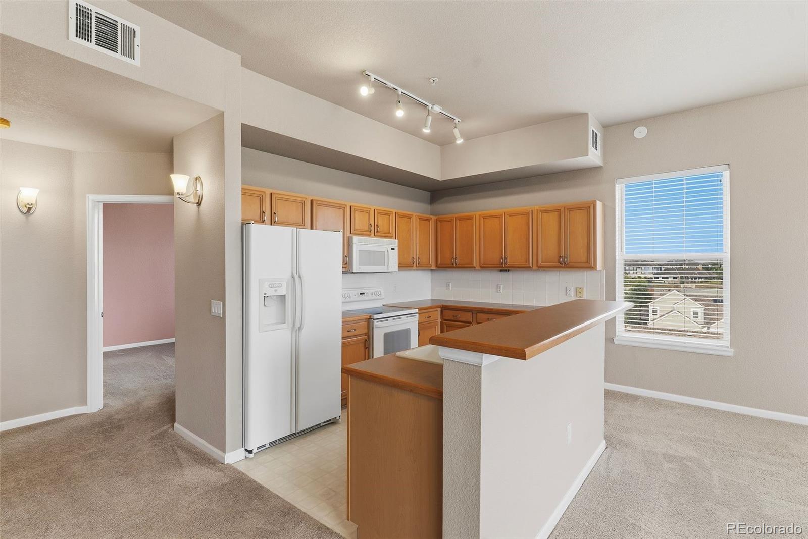 MLS Image #11 for 15475  andrews drive 412,denver, Colorado
