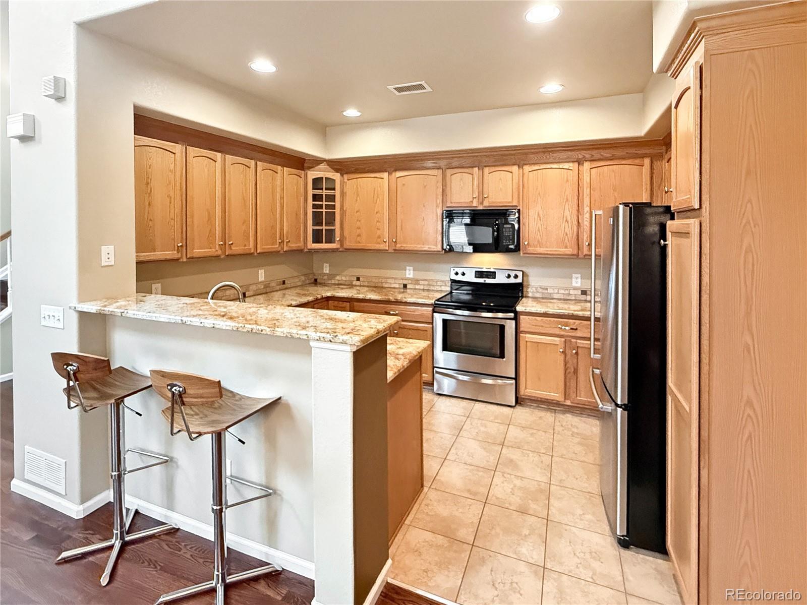 MLS Image #3 for 10521  ashfield street 4d,highlands ranch, Colorado