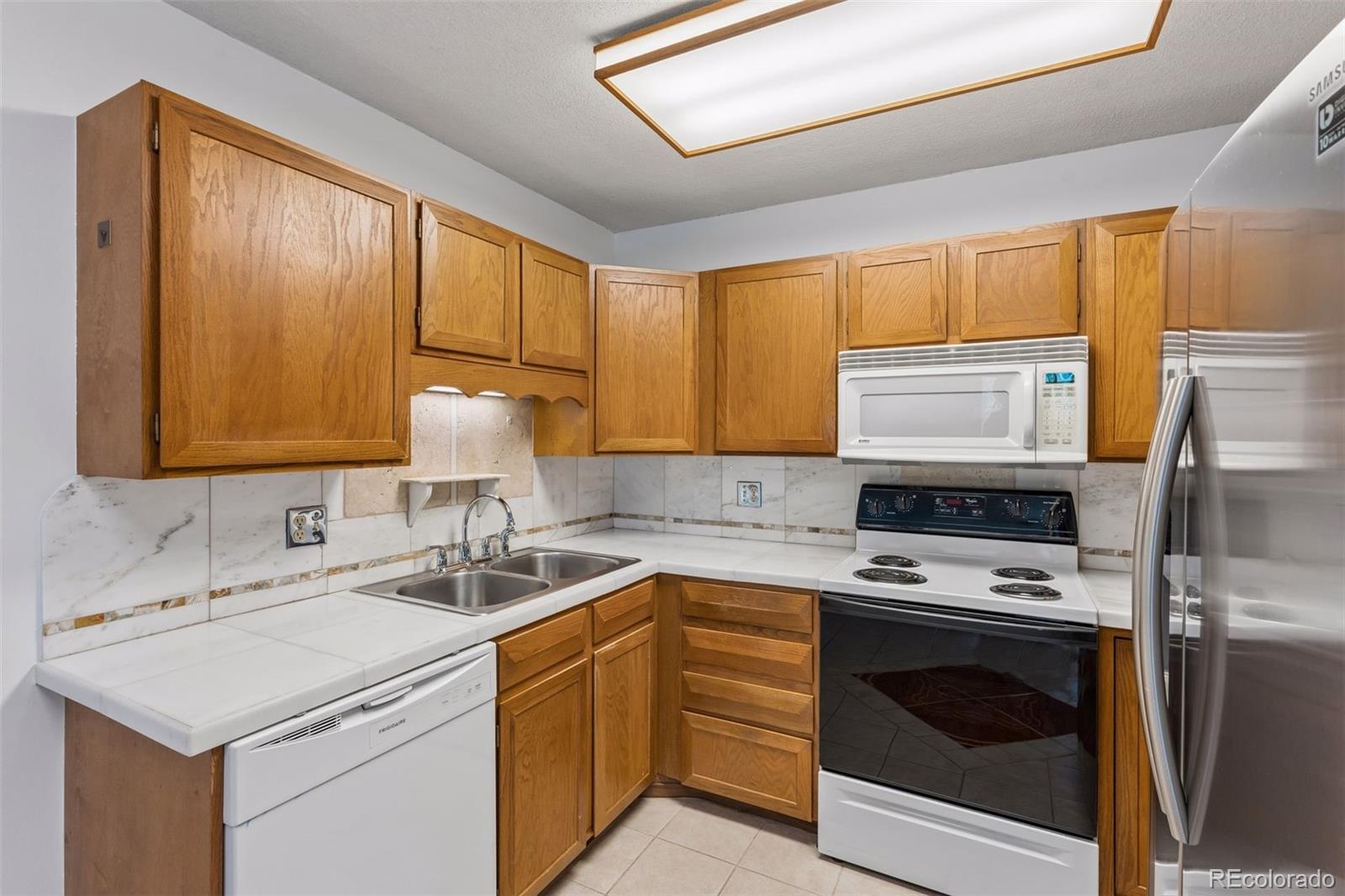 MLS Image #11 for 13626 e bates avenue,aurora, Colorado