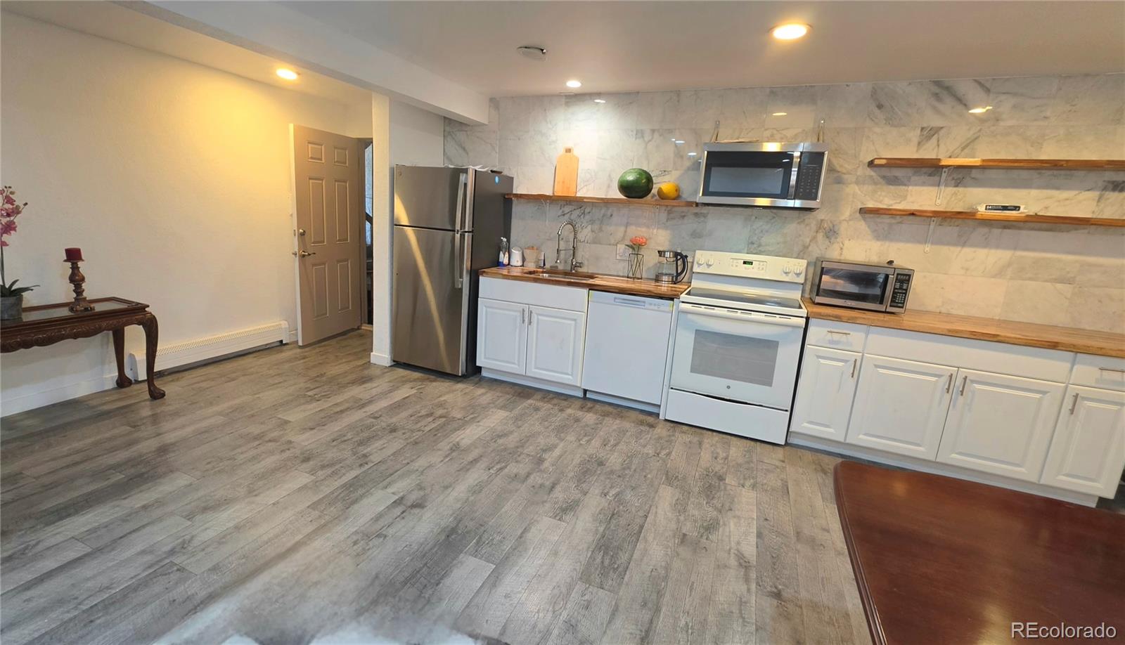 MLS Image #4 for 1525 s holly street,denver, Colorado
