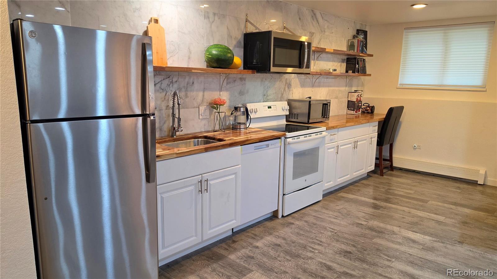 MLS Image #7 for 1525 s holly street,denver, Colorado