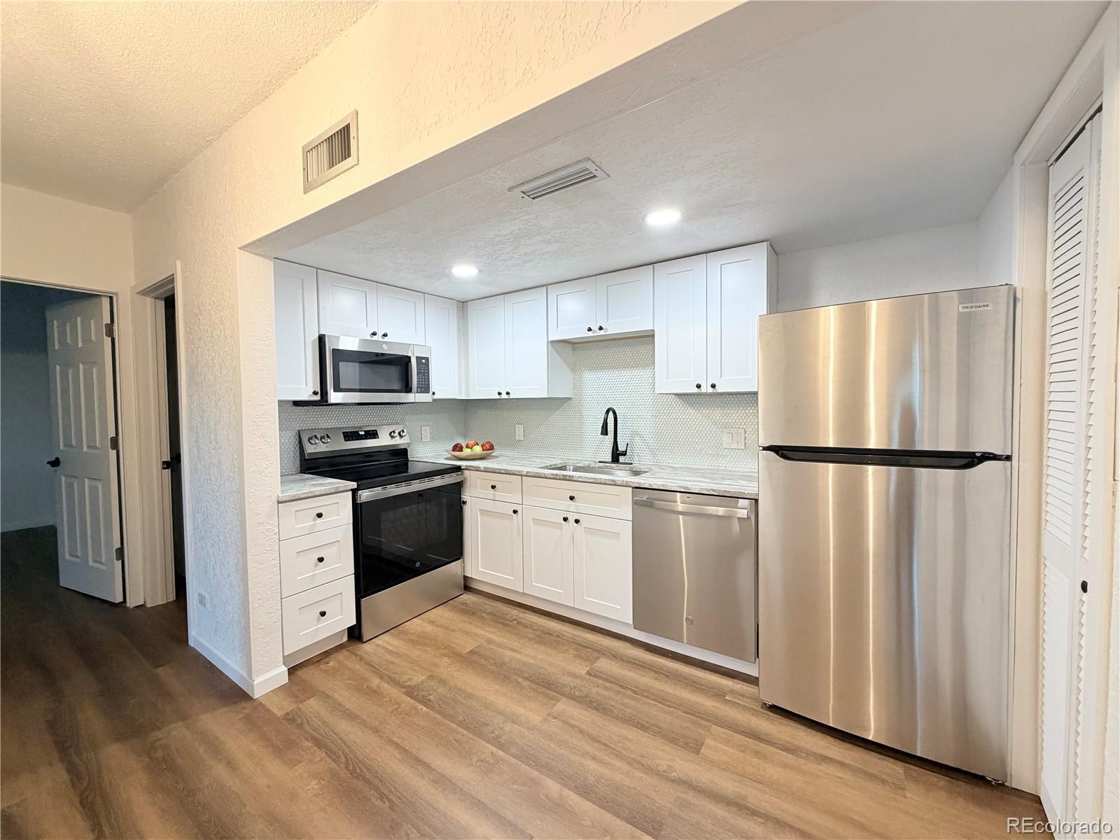 MLS Image #11 for 9995 e harvard avenue,denver, Colorado