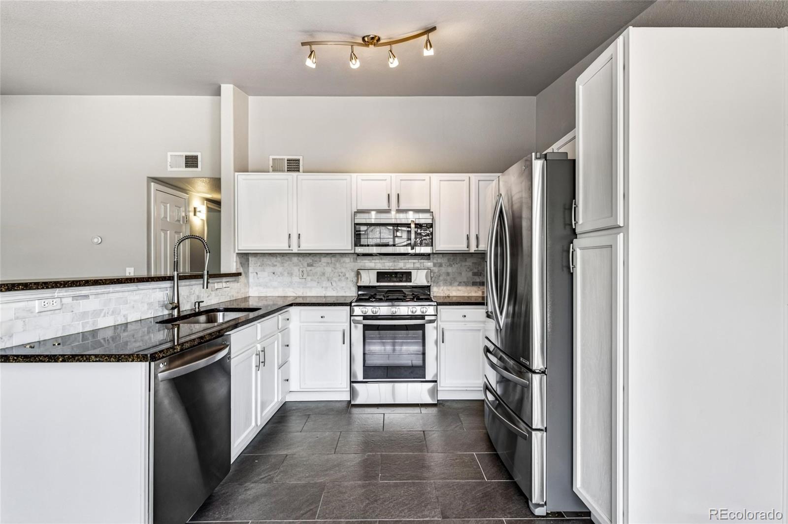 MLS Image #3 for 9992 e idaho circle,aurora, Colorado